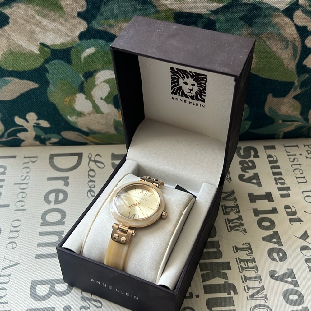 Classic Anne Klein Pearl cream color watch. Purchased 10 years ago. Never worn.